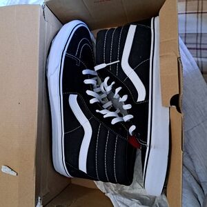 Vans Black and White High-Top Sneakers